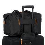 Bric's X-Collection 18-inch folding duffle bag in durable fabric with handles and zip closure, lightweight travel luggage.