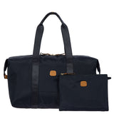 Bric's X-Collection 18-inch folding duffle bag in durable fabric with adjustable shoulder strap and zippered main compartment.