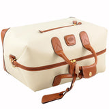 Bric's Firenze 22-inch cargo duffel bag in durable fabric with leather accents, featuring a spacious main compartment and sturdy handles.