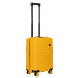 Bric's B|Y Ulisse 21-inch expandable spinner luggage with hard shell and four wheels, black color, front view.