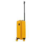 Bric's B|Y Ulisse 21-inch expandable spinner luggage with hard shell, four wheels, and telescoping handle for travel.