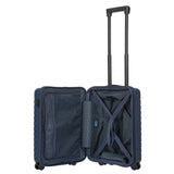 Bric's B|Y Ulisse 21-inch expandable spinner luggage with sleek design and four wheels for smooth travel.