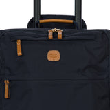 Bric's X-Collection 21-inch carry-on spinner luggage with four wheels and sleek design, lightweight and durable for travel.