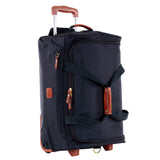 Bric's X-Collection 21-inch rolling duffle luggage with durable fabric, adjustable handle, and side wheels for easy travel.