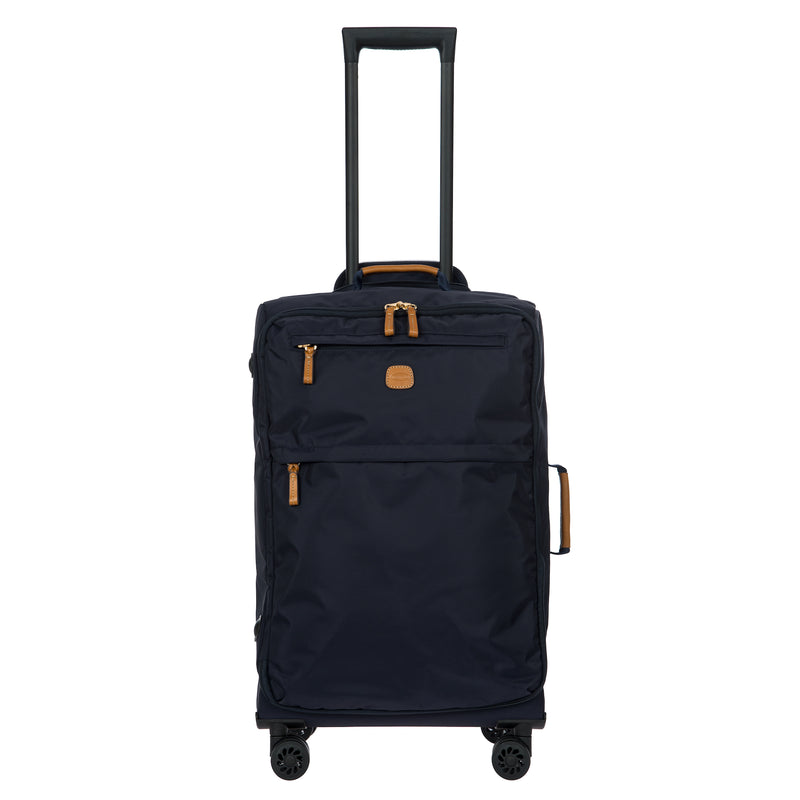 Bric's X-Collection checked 30-inch spinner luggage with four wheels and a sturdy handle, featuring a stylish checked pattern.