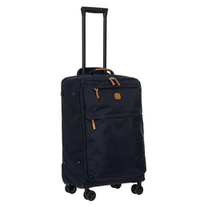 Bric's X-Collection checked 30-inch spinner luggage with durable fabric and four wheels for smooth rolling.