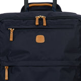 Bric's X-Collection checked 30-inch spinner luggage with fabric exterior, four wheels, and retractable handle.