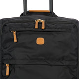 Bric's X-Collection checked 30-inch spinner luggage with durable wheels and a modern design for travel.