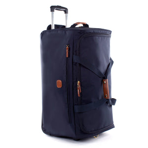 Bric's X-Collection 28-inch rolling duffle luggage with durable fabric and retractable handle, black color, and multiple compartments.