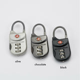 Black Briggs & Riley TSA cable luggage lock, accessory with key lock mechanism, designed for secure travel.