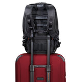 Briggs & Riley ZDX Cargo Backpack with multiple compartments, black nylon material, and padded shoulder straps for comfortable carrying.