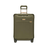Briggs & Riley Baseline medium expandable spinner suitcase with blue hard shell exterior and four spinner wheels.