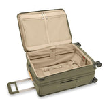 Briggs & Riley Baseline medium expandable spinner suitcase with blue exterior, four wheels, and telescoping handle.