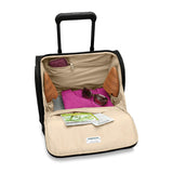 Blue Briggs & Riley Baseline 2-wheel carry-on luggage with a sleek hard shell and extendable handle for easy travel.