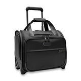 Briggs & Riley Baseline 2-wheel carry-on luggage in blue with a hard shell and telescoping handle for easy travel.