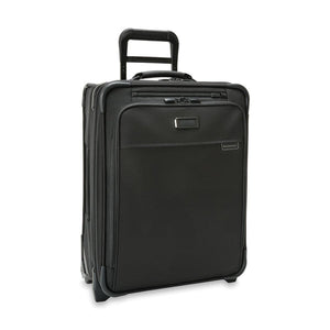 Briggs & Riley Baseline Global 2-Wheel Carry-On luggage in blue with telescoping handle and four durable wheels.