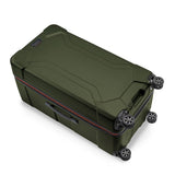 Briggs & Riley Torq extra large checked luggage trunk with four spinner wheels and durable hard shell in black.