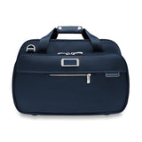 Briggs & Riley Baseline expandable cabin bag, navy blue duffel bag with handles and zipper compartments, designed for travel.