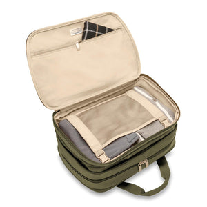 Briggs & Riley Baseline expandable cabin bag duffel with sturdy handles, wheels, and a sleek black design for travel.