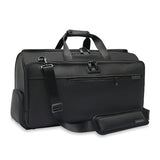 Briggs & Riley Baseline Garment Duffle bag with sturdy handles and spacious interior for travel and business trips.