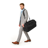 Briggs & Riley Baseline Garment Duffle bag in black with durable fabric and side handles for travel and organization.