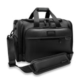 Briggs & Riley Baseline underseat duffel bag with black fabric and zipper compartments, designed for travel and easy carrying.
