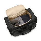 Briggs & Riley Baseline underseat duffle bag with black fabric, compact design, and handle for travel convenience.