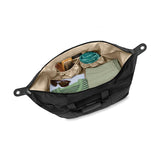 Briggs & Riley Baseline Weekender Duffle bag in black, showing the spacious main compartment and sturdy handles.