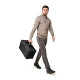 Briggs & Riley Baseline Weekender Duffle bag in black with sturdy handles and spacious main compartment for travel storage.