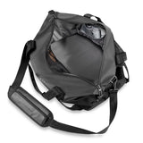 Briggs & Riley ZDX Cargo Satchel duffle bag with sturdy handles and spacious main compartment, black fabric with leather accents.