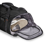 Briggs & Riley ZDX large travel duffle bag with durable fabric and sturdy handles, designed for spacious packing and travel convenience.