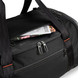 Briggs & Riley ZDX large travel duffle bag with black durable fabric and sturdy handles, designed for spacious travel storage.