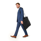Briggs & Riley Baseline classic garment bag with zipper closure, carrying handles, and a sleek black fabric exterior.