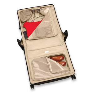 Briggs & Riley Baseline Deluxe Wardrobe Spinner garment bag with handles and wheels, designed for travel and clothing protection.