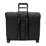 Briggs & Riley Baseline Deluxe Wardrobe Spinner garment bag with multiple compartments and a sleek blue exterior.