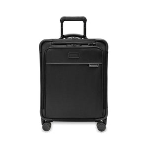 Blue Briggs & Riley Baseline Global Carry-On Spinner luggage with four multi-directional wheels and retractable handle.