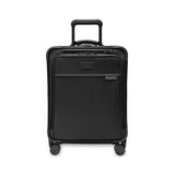 Blue Briggs & Riley Baseline Global Carry-On Spinner luggage with four multi-directional wheels and retractable handle.