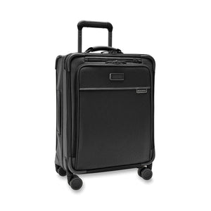 Blue Briggs & Riley Baseline Global Carry-On Spinner luggage with four spinner wheels and durable hard shell design.