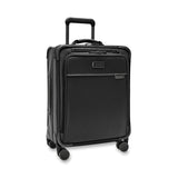 Blue Briggs & Riley Baseline Global Carry-On Spinner luggage with four spinner wheels and durable hard shell design.