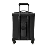 Briggs & Riley Baseline Global Carry-On Spinner luggage with blue hard shell and four spinner wheels, side handle, and TSA lock.