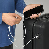 Briggs & Riley Torq domestic carry-on spinner suitcase with four wheels and durable hard shell in black.