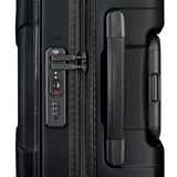 Briggs & Riley Torq domestic carry-on spinner with sturdy black hard shell and four multi-directional wheels on smooth airport surface.