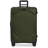 Briggs & Riley Torq medium spinner suitcase in stealth black with four wheels and a durable hard shell exterior.