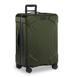 Briggs & Riley Torq medium spinner suitcase in stealth black with four multi-directional wheels and a durable hard shell exterior.