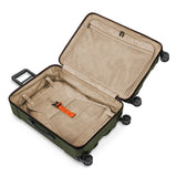 Briggs & Riley Torq medium spinner suitcase in stealth black with four smooth-rolling wheels and a durable hard shell exterior.