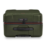 Briggs & Riley Torq medium spinner suitcase in stealth black with four wheels and a sturdy handle for easy travel.