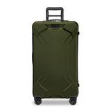 Briggs & Riley Torq medium black trunk spinner with four wheels and telescoping handle for easy travel.