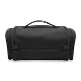 Briggs & Riley Baseline Executive Essentials toiletry kit with multiple compartments and clear zippered pockets for travel organization.