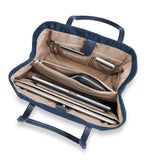 Briggs & Riley Rhapsody Essential Tote bag showing its spacious interior, sturdy handles, and sleek black exterior.