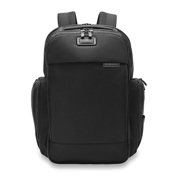Briggs & Riley Baseline Traveler Backpack with multiple compartments and padded shoulder straps, designed for travel convenience.